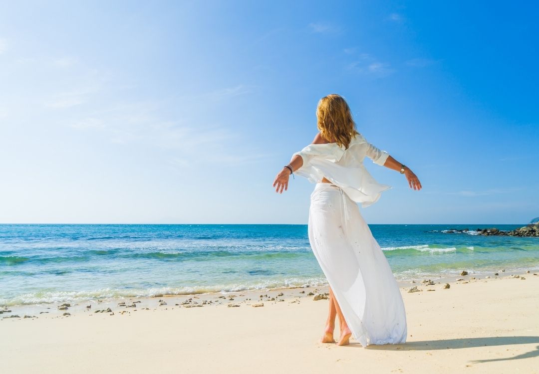 Young Beautiful Woman during Beach